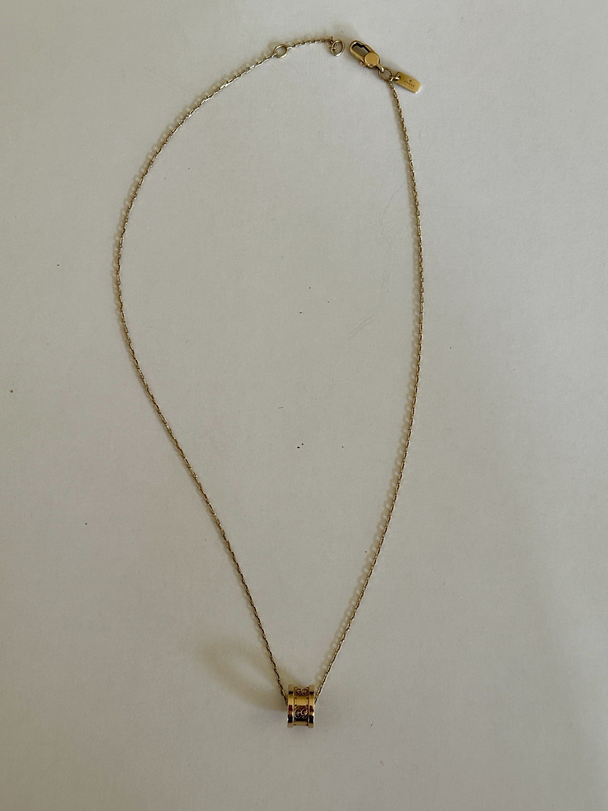 18 Carat Yellow Gold Gucci Barrel Necklace. GG Icon. In Original Box With Pouch.