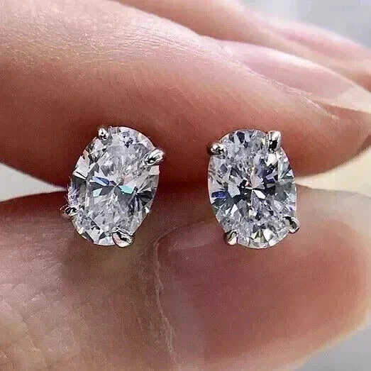 4Ct Oval Cut Lab-Created Diamond Solitaire Stud Earrings 14K White Gold Plated