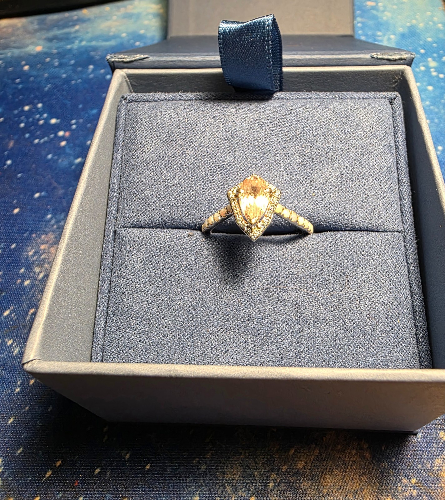 14k white gold ring size 7 pear shaped pink sapphire, 21 opals, 22 blue diamonds