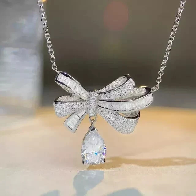 1.50Ct Pear Cut Moissanite Bow Butterfly Pendant 14K White Gold Plated 18″ Chain